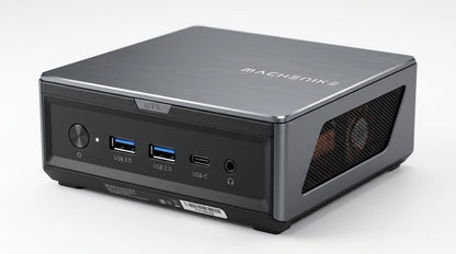 future tech gadgets Canada. smart tech store Canada. Machenike GTX PH94H48 Mini PC. Gallery image 5. The compact desktop computer is positioned at a slight angle, showcasing its front and right side. The body features a brushed metallic finish in dark gray, with a matte black section housing various ports. Visible are two USB 3.0 ports, one USB 2.0 port, a USB-C port, and a headphone jack, all clearly labeled. A power button with a circular design is located on the left side.