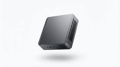 future tech gadgets Canada. smart tech store Canada. Machenike GTX PH94H48 Mini PC. Gallery image 7. The product is a compact, rectangular desktop computer, shown floating against a seamless white background. The unit features a matte black finish with a subtle texture, and its front side displays several ports, including USB connections and a power button. A mesh grille is visible on one side, suggesting ventilation. The lighting is soft, highlighting the sleek design without harsh shadows.