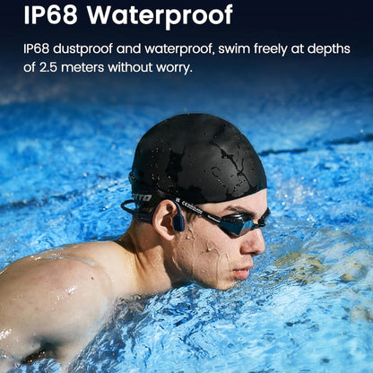 future tech gadgets Canada. smart tech store Canada. Mojawa HaptiFit Terra Head Wearable Sport System. Gallery image 4. A swimmer is captured in profile, gliding through clear blue water. He wears a sleek black swim cap and dark goggles, with water droplets glistening on his skin. The background features rippling water, creating a dynamic sense of movement. The image is well-lit, highlighting the swimmer's focused expression and the texture of the water.