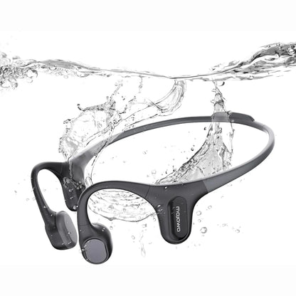 future tech gadgets Canada. smart tech store Canada. Mojawa RUN PLUS Bone Conduction Headphones. Gallery image 6. The image features a pair of wireless headphones submerged in water, creating a dynamic splash effect. The headphones are primarily black with a sleek, matte finish and have rounded ear pieces. They are positioned centrally in the frame, with water droplets and splashes surrounding them, emphasizing their water-resistant design.