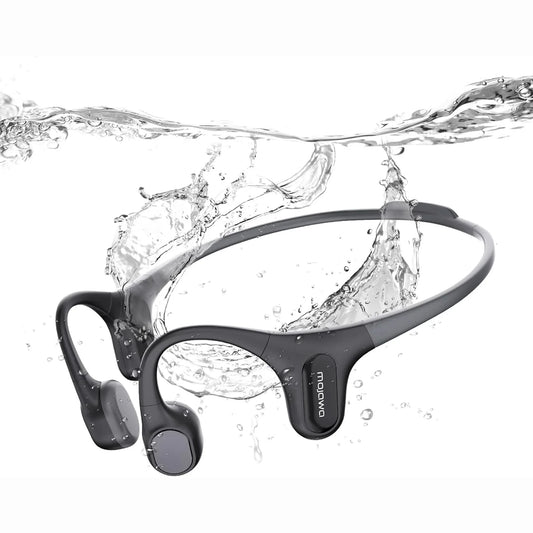 future tech gadgets Canada. smart tech store Canada. Mojawa RUN PLUS Bone Conduction Headphones. Gallery image 6. The image features a pair of wireless headphones submerged in water, creating a dynamic splash effect. The headphones are primarily black with a sleek, matte finish and have rounded ear pieces. They are positioned centrally in the frame, with water droplets and splashes surrounding them, emphasizing their water-resistant design.