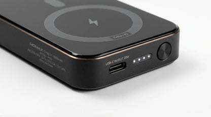 premium tech accessories Canada. wireless audio Canada. Momax Q.Mag X1 10000mAh Wireless Battery Pack. Gallery image 9. Lines name one specific SKU—never substitute a generic lookalike from the category. After review passes, each render should still read as a fresh studio viewpoint of that same physical unit.
