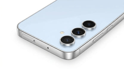 future tech gadgets Canada. smart tech store Canada. Premium Samsung Galaxy S24 FE. Gallery image 6. The smartphone is positioned at an angle, showcasing its sleek design with a light blue glossy back and a silver metallic edge. Three circular camera lenses are prominently displayed on the upper left corner, accompanied by a small flash. The device rests on a smooth white surface, with soft lighting highlighting its reflective surfaces and creating gentle shadows.