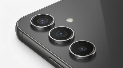 future tech gadgets Canada. smart tech store Canada. Premium Samsung Galaxy S24 FE. Gallery image 9. The image features a close-up view of a smartphone's rear camera module, positioned in the bottom right corner of the frame. The camera lenses are arranged in a triangular formation, each encircled by a silver ring, set against a matte black surface that reflects soft light. A small LED flash is located above the lenses.