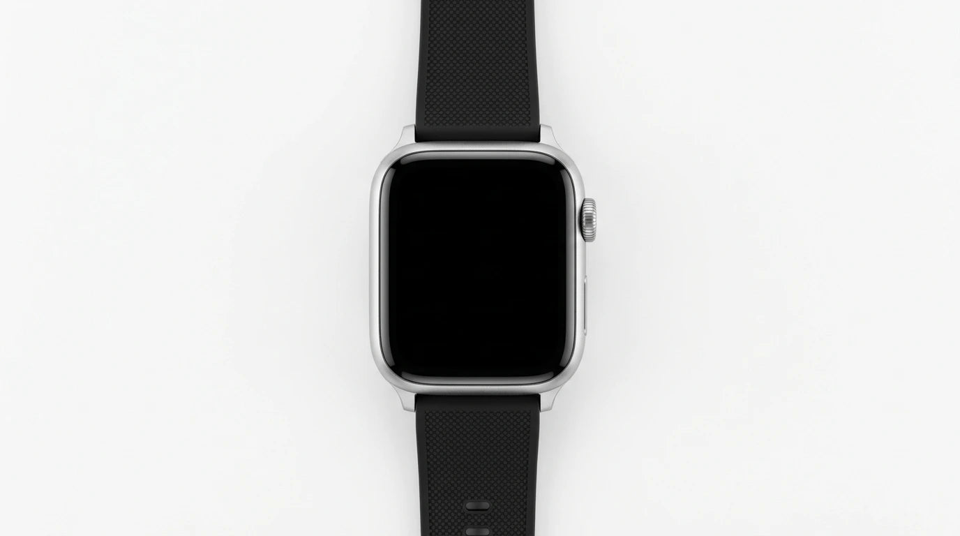 smart tech store Canada. premium tech accessories Canada. Techtron SWH18 (T52 / T67) Smart Watch. Gallery image 2. The smartwatch is centered in the frame, viewed from above against a seamless white background. It features a sleek, square face with a glossy black screen that is currently off. The body is silver, with a smooth finish, and a textured black rubber strap that extends downward. On the right side of the watch, a round button is visible, adding to its modern design.