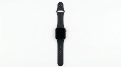 smart tech store Canada. premium tech accessories Canada. Techtron SWH18 (T52 / T67) Smart Watch. Gallery image 4. A black smartwatch is centered in the frame, lying flat against a seamless white background. The watch features a glossy square face with a dark screen, and a smooth, matte black silicone strap that extends on either side. On the right side of the watch, a small round button is visible, and the strap has several adjustment holes.