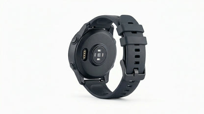 smart tech store Canada. premium tech accessories Canada. Techtron SWH36 (Z123 / Z137) Smart Watch. Gallery image 6. The image shows a black smartwatch positioned at a slight angle, revealing its back side. The watch features a smooth, matte finish with a circular design and a textured strap that has multiple adjustment holes. On the back, there are several sensors and a charging port, which are clearly visible.