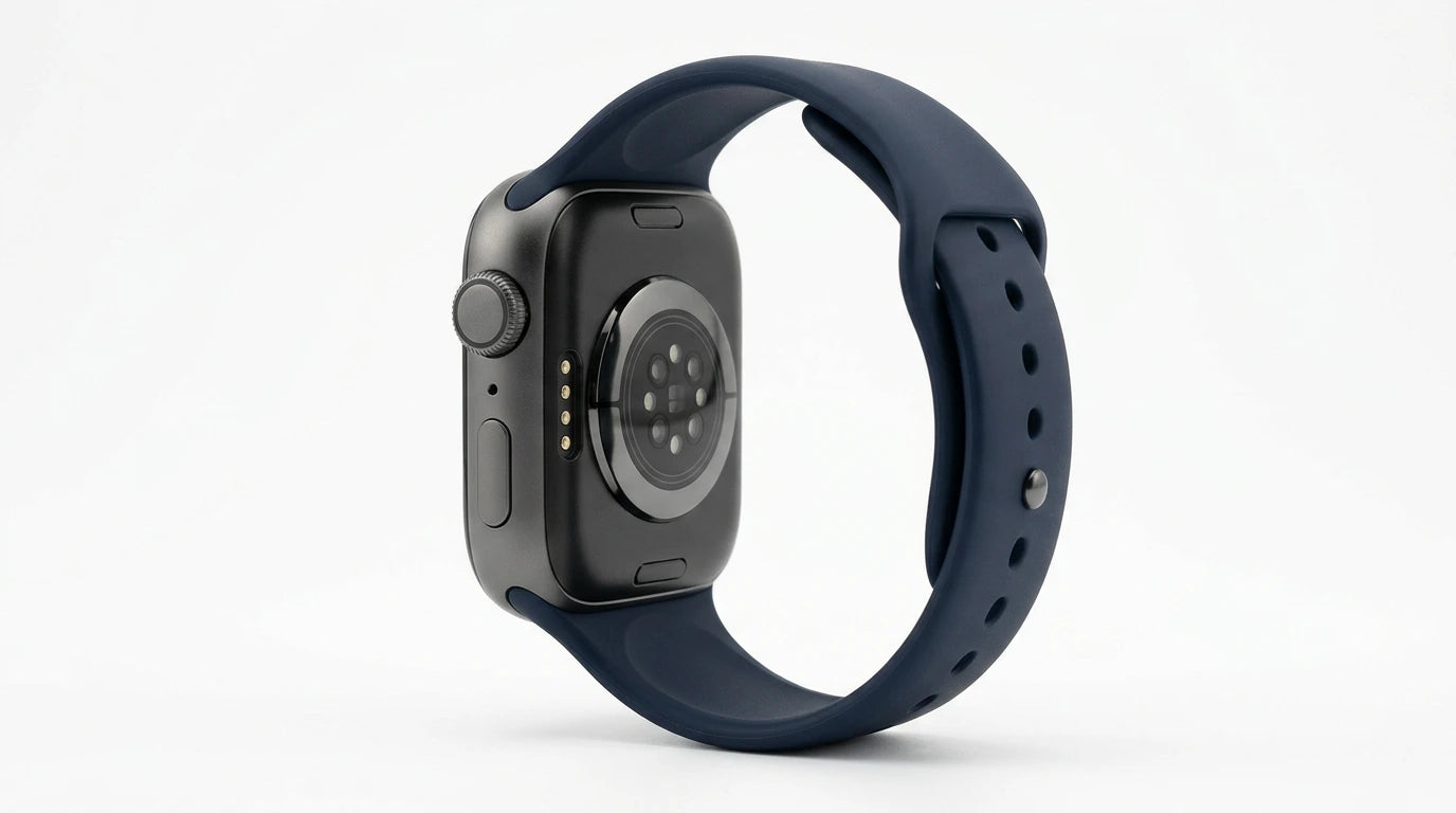 smart tech store Canada. premium tech accessories Canada. Techtron SWH36 (Z123 / Z137) Smart Watch. Gallery image 8. The smartwatch is displayed at a slight angle, showcasing its side profile against a seamless white background. The body is a sleek black with a matte finish, and it features a round sensor area on the back. A navy blue silicone strap wraps around the wrist, with several holes for adjustment. The side of the watch includes a prominent round button and a smaller button below it.